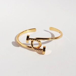 Gold Open Cuff Bracelet with Knot Accent